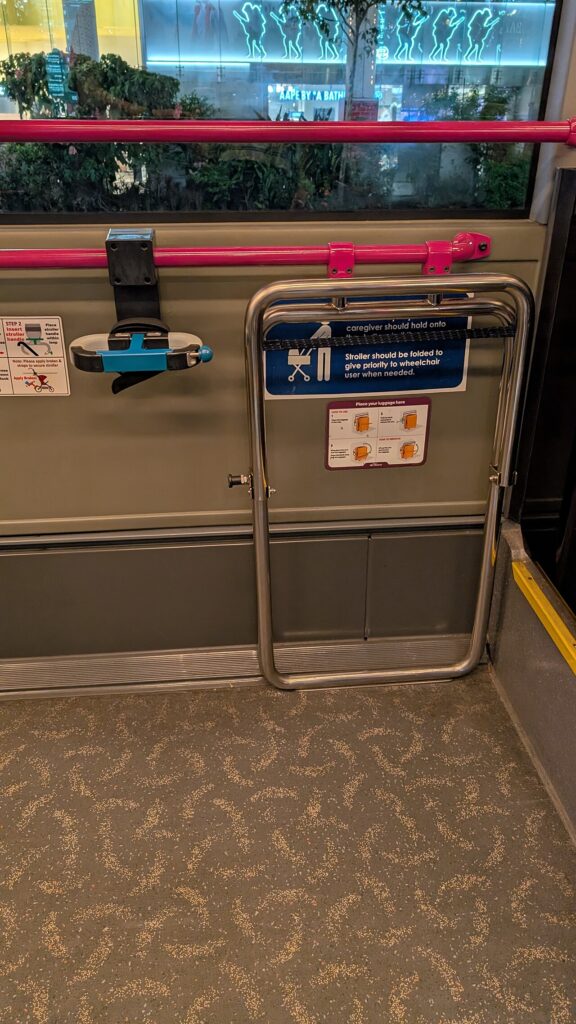 Singapore transfer fares guide: foldable luggage rack inside a singapore public bus